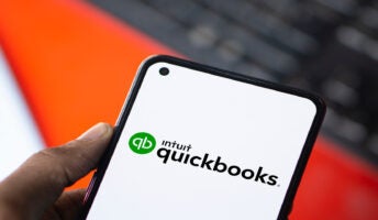 QuickBooks logo on phone screen