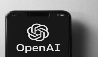 OpenAI logo on phone screen