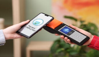 Person paying on mobile