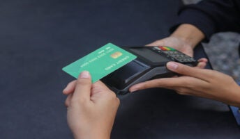 Person paying with credit card