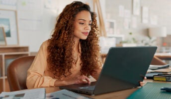 Woman working on laptop