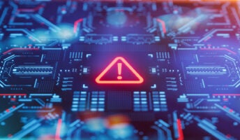 Computer chip with alert symbol on it