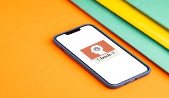 Phone with Claude on screen