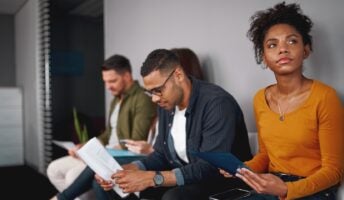 People waiting for job interview anxiously in room