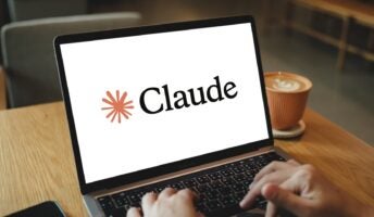 Claude AI on laptop with user typing