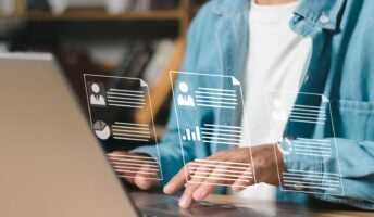 Person typing looking through job applications