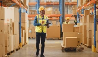 Men working in shipping warehouse