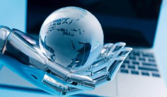 A robot hand holds a crystal ball